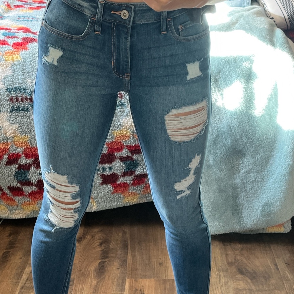 Mid-rise super skinny blue ripped jeans